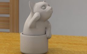  杯中的小猫侧视图